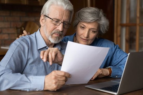 Couple reviewing funeral plan options