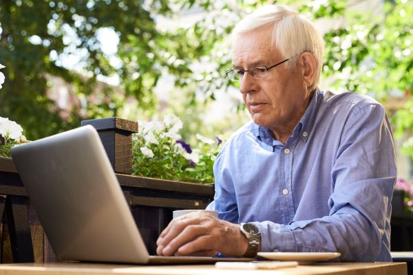 Man Researching Funeral Plans