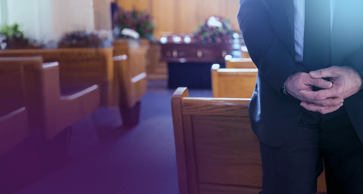 Man in suit at funeral