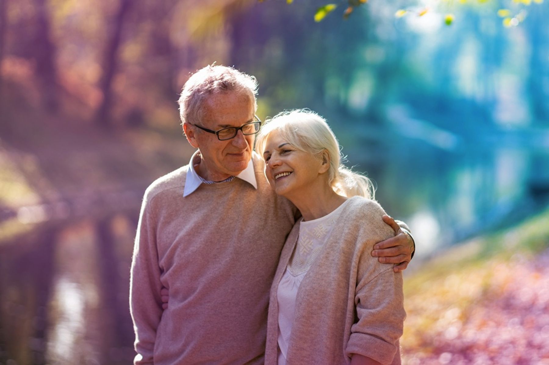 Older Couple Walking In Wood