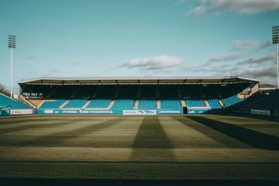 Football Stadium With Blue Seats