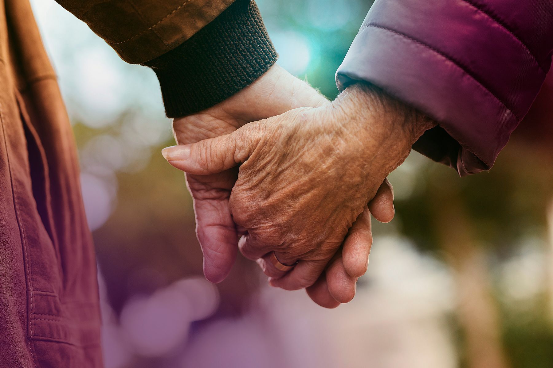 Older Couple Holding Hands