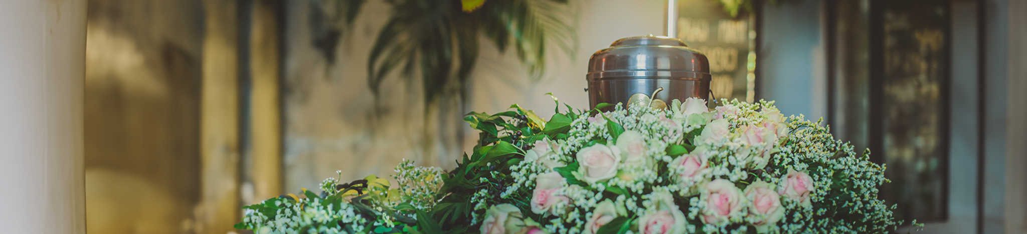 Funeral Urn Surrounded By Flowers