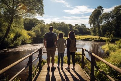 Family Looking Out Over Lake