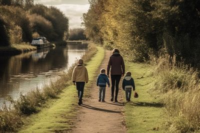 Family Walking By Canal