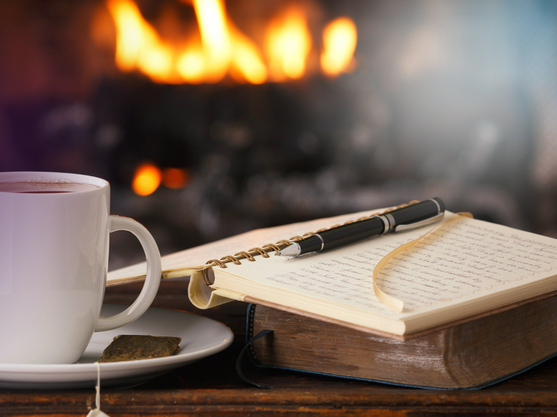 book and coffee on table
