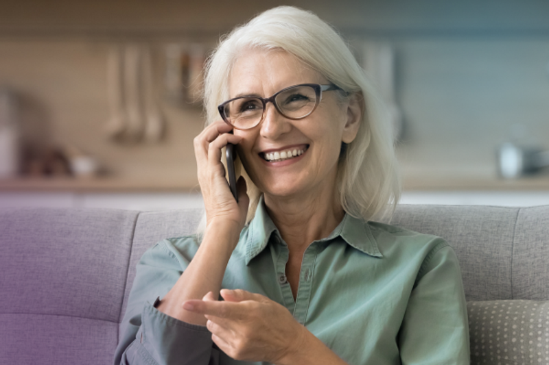 Smiling lady on phone