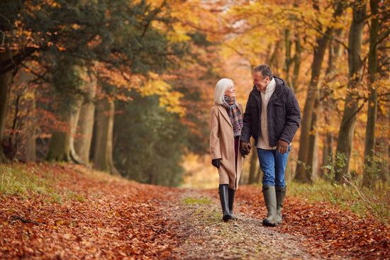 Couple walking in trees