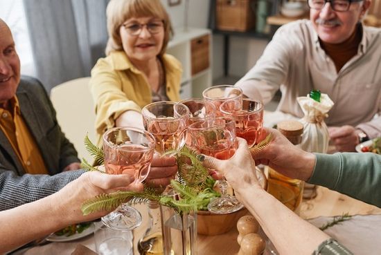 Group toasting a friend's memory