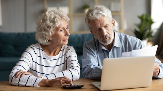 couple looking at plan options