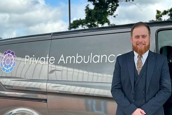 Alex Moore Funeral Operations Manager With Ambulance