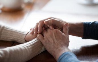 Comforting hand holding2