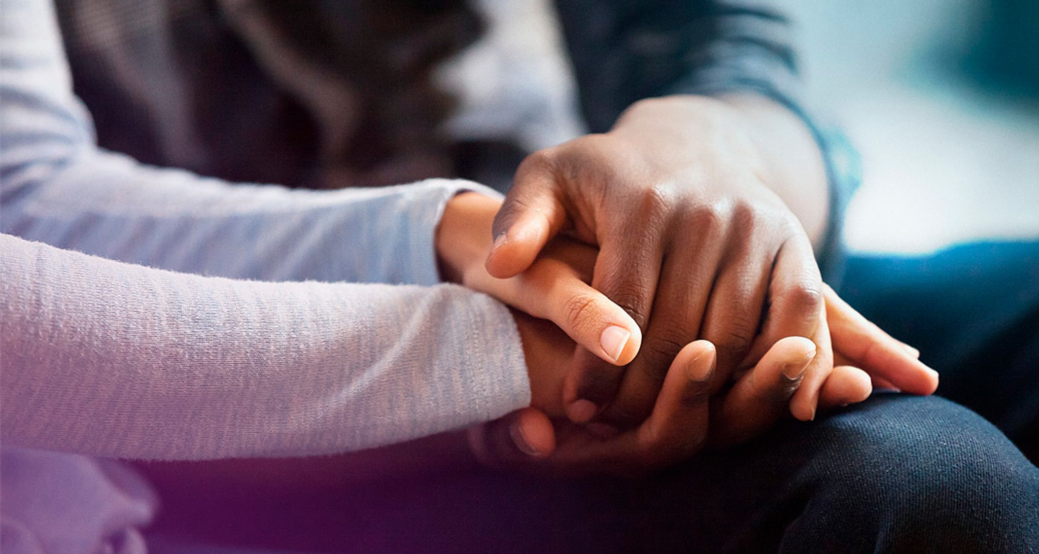 Hands Clasped In Lap Mobile Banner