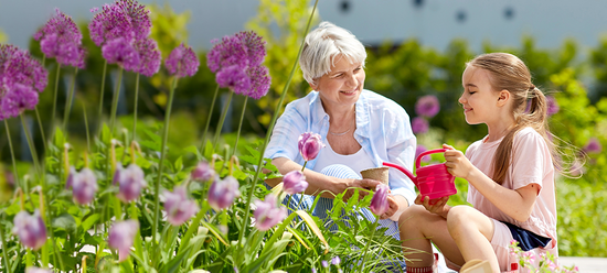 Lady and child gardening