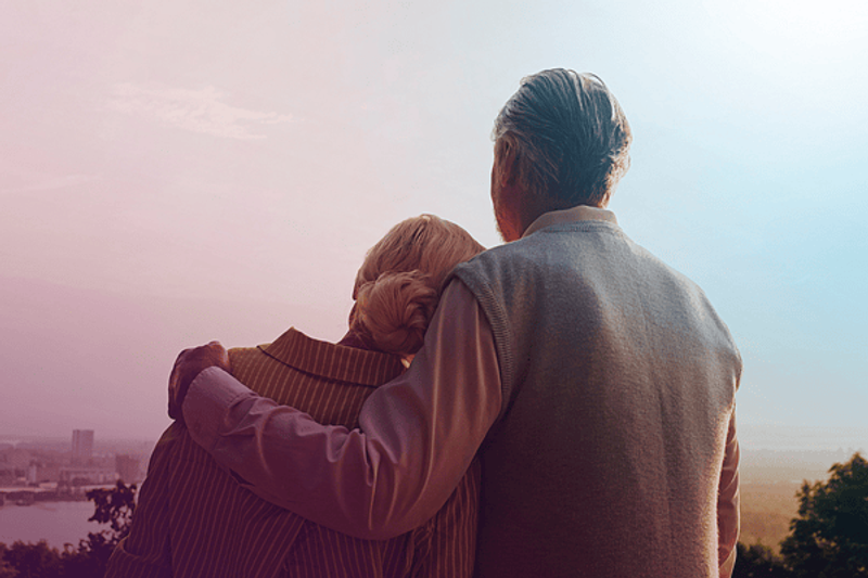 Couple looking across city