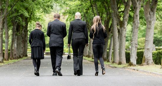 Family leaving funeral together